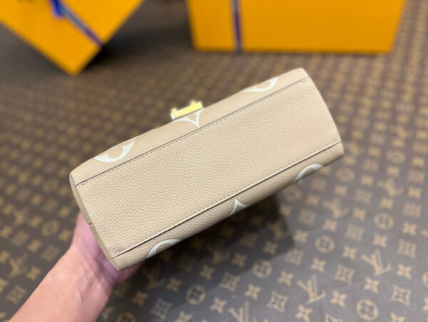 LOUIS VUITTON Madeleine BB Bicolore Empreinte - Image 9