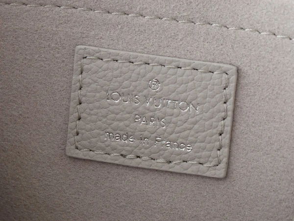 OnTheGo East West Bicolour Monogram Empreinte Leather - Image 11