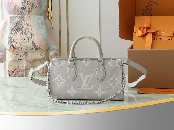 OnTheGo East West Bicolour Monogram Empreinte Leather