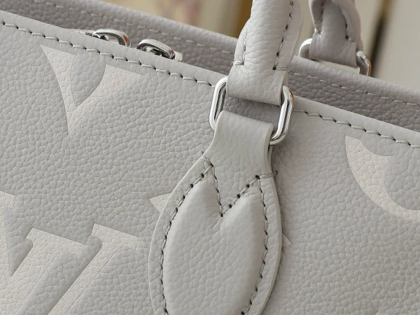 OnTheGo East West Bicolour Monogram Empreinte Leather - Image 7