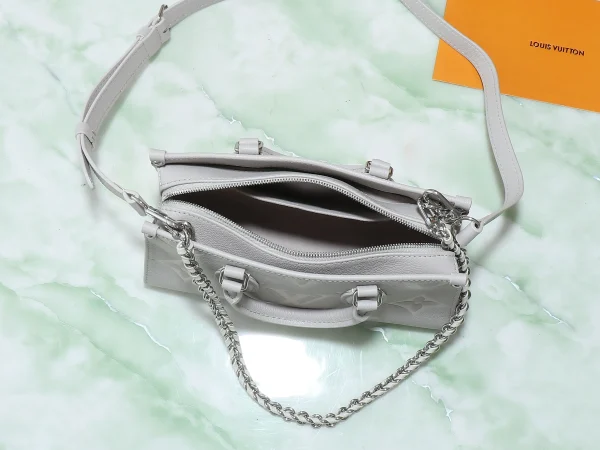 OnTheGo East West Bicolour Monogram Empreinte Leather - Image 10