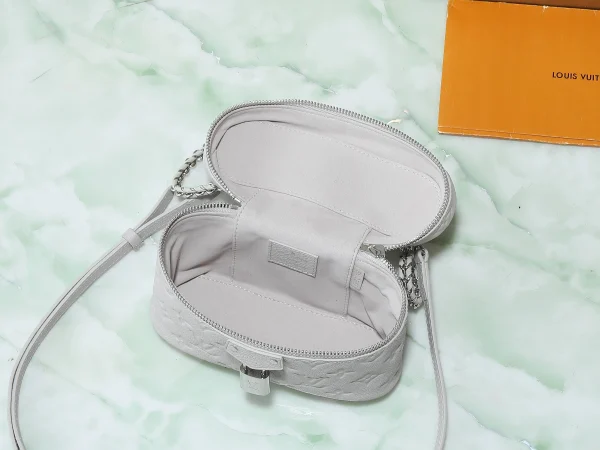 Vanity Chain Pouch Monogram Empreinte Leather - Image 10