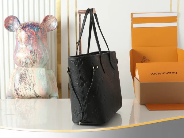 LOUIS VUITTON Empreinte Monogram Giant Neverfull MM Black - Image 9