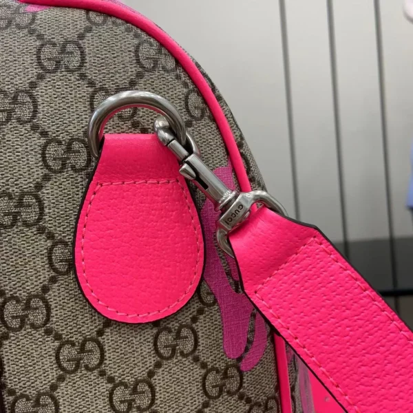 Medium duffle bag with print in Beige Pink GG Canvas - Image 9