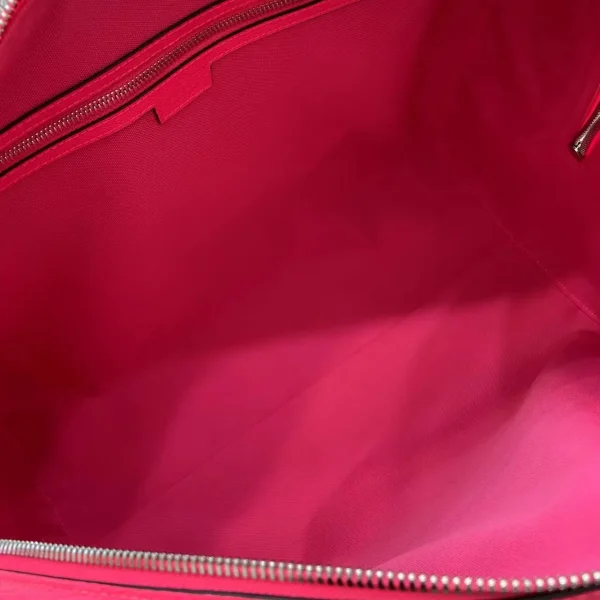 Medium duffle bag with print in Beige Pink GG Canvas - Image 10