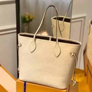 Neverfull MM Monogram Empreinte Leather Handbags