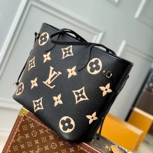 Neverfull MM Monogram Empreinte Leather Handbags