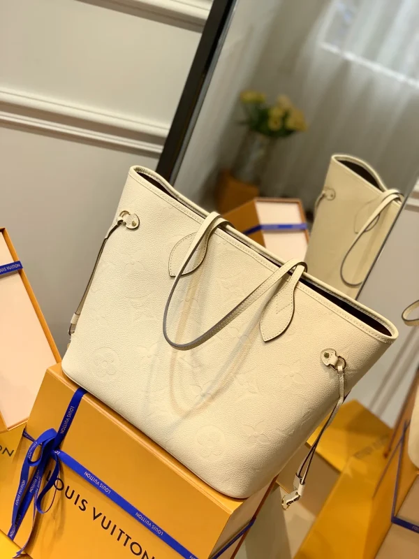 Neverfull MM Monogram Empreinte Leather Handbags - Image 4