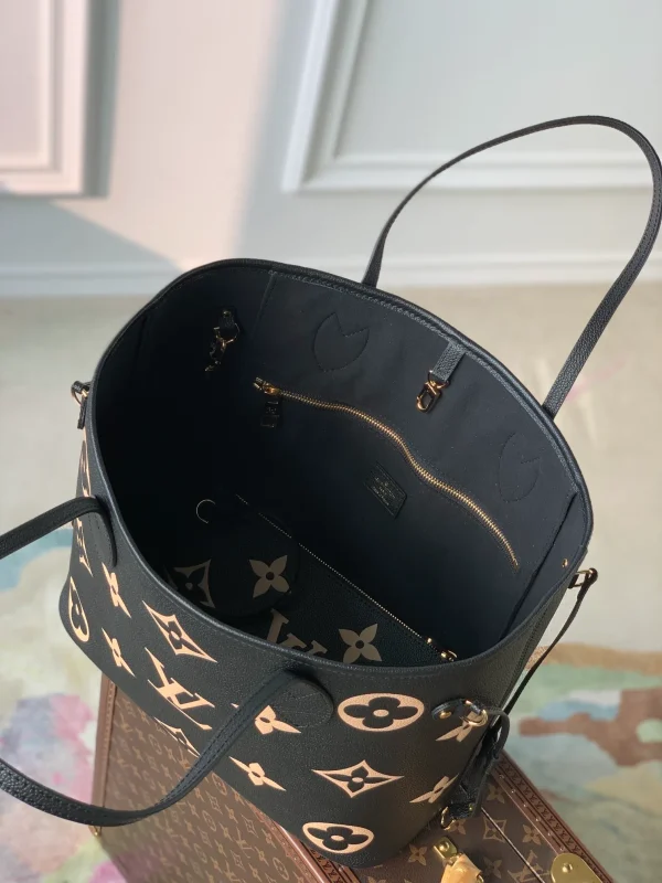 Neverfull MM Monogram Empreinte Leather Handbags - Image 10