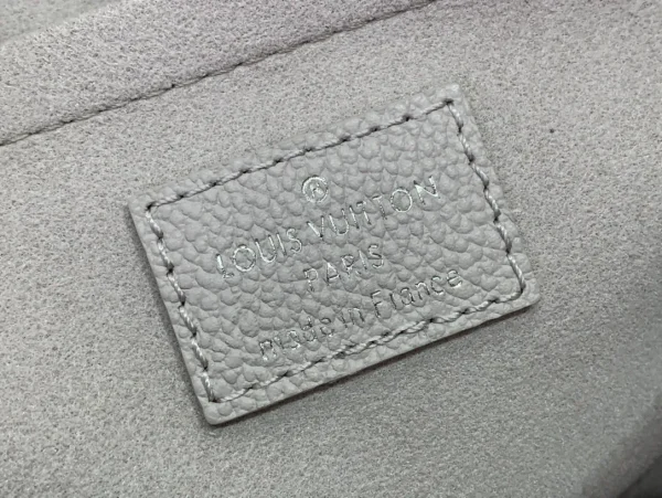 OnTheGo East West Bicolor Monogram Empreinte Leather - Image 9