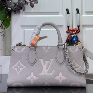 OnTheGo East West Bicolor Monogram Empreinte Leather