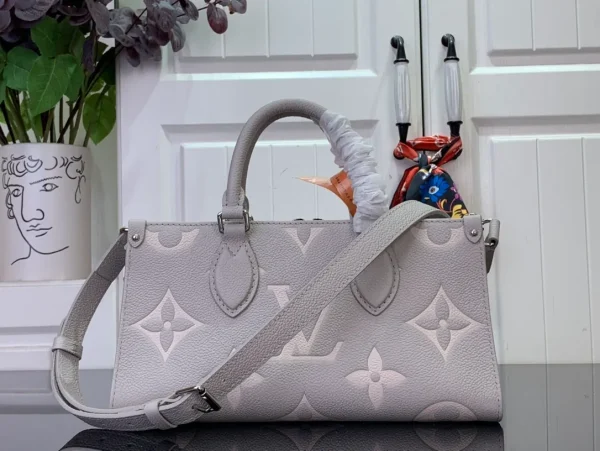 OnTheGo East West Bicolor Monogram Empreinte Leather - Image 3