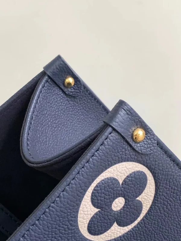 OnTheGo MM Bicolor Monogram Empreinte Leather - Image 9