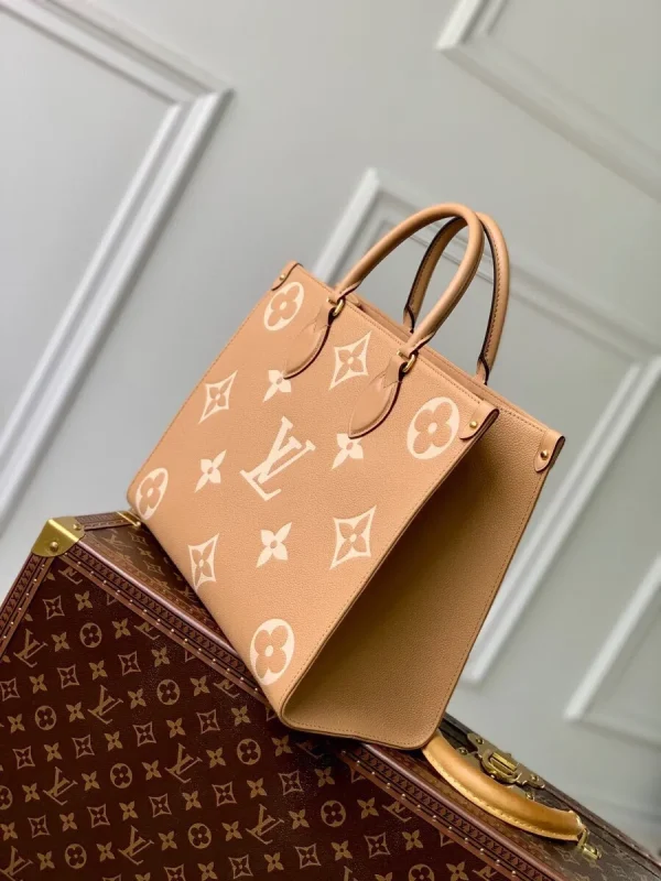 OnTheGo MM Bicolor Monogram Empreinte Leather Handbags - Image 10