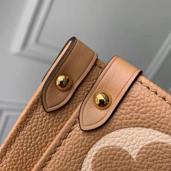 OnTheGo MM Bicolor Monogram Empreinte Leather Handbags - Image 3