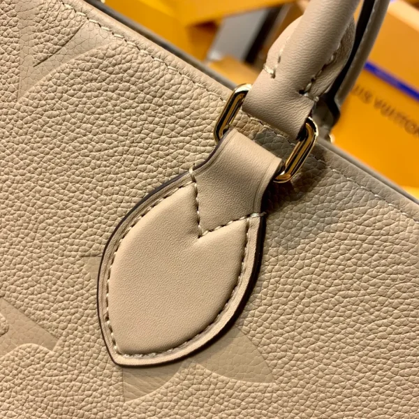 OnTheGo MM Monogram Empreinte Leather - Image 8