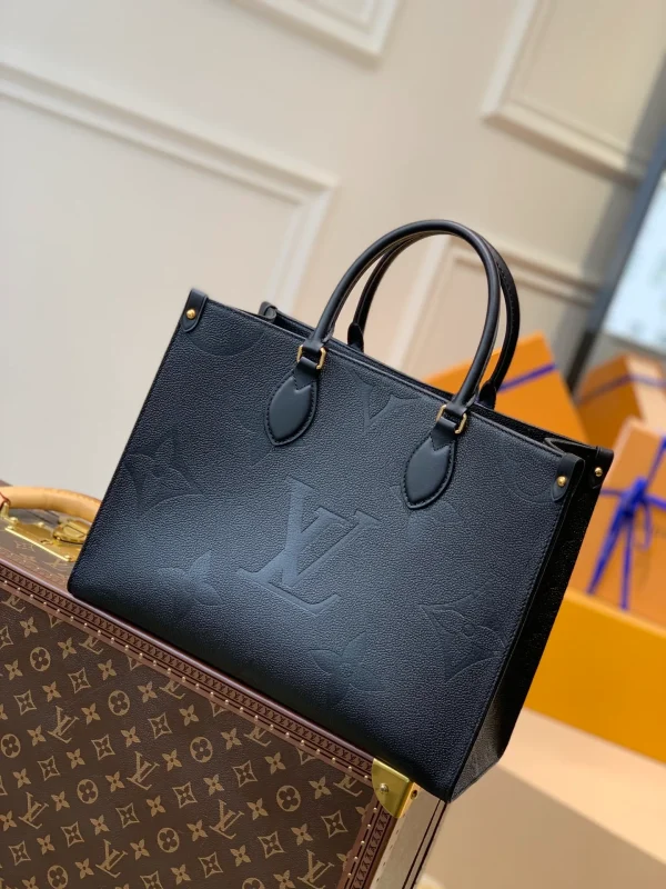 OnTheGo MM Monogram Empreinte Leather Handbags
