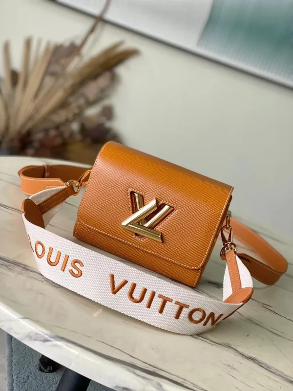 Twist MM Epi Leather Handbags