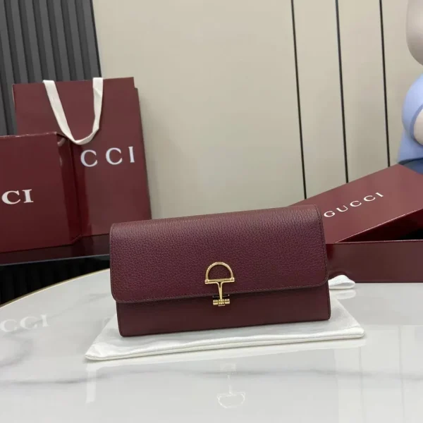 Continental wallet with Gucci script in black leather