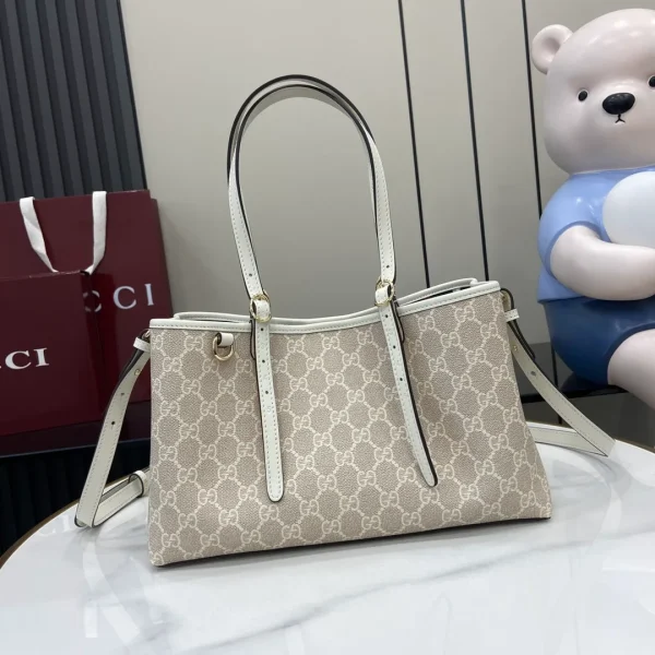 GG Emblem large tote bag in Beige White GG Canvas - Image 3