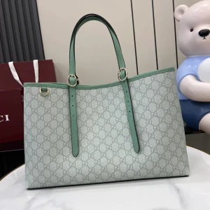 GG Emblem medium tote bag in Green GG Canvas