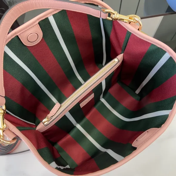 GG Emblem small bucket bag in light pink - Image 11