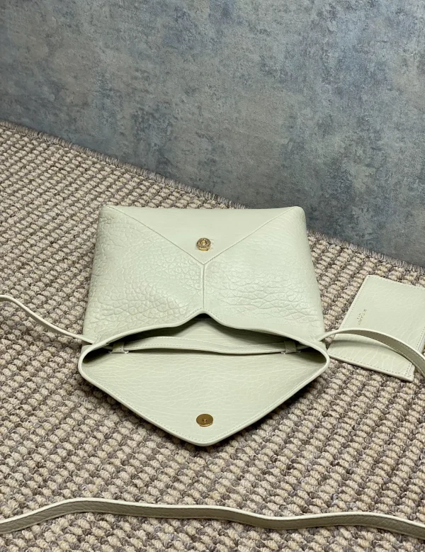 Saint Laurent Small Leather Clutch in White - Image 6