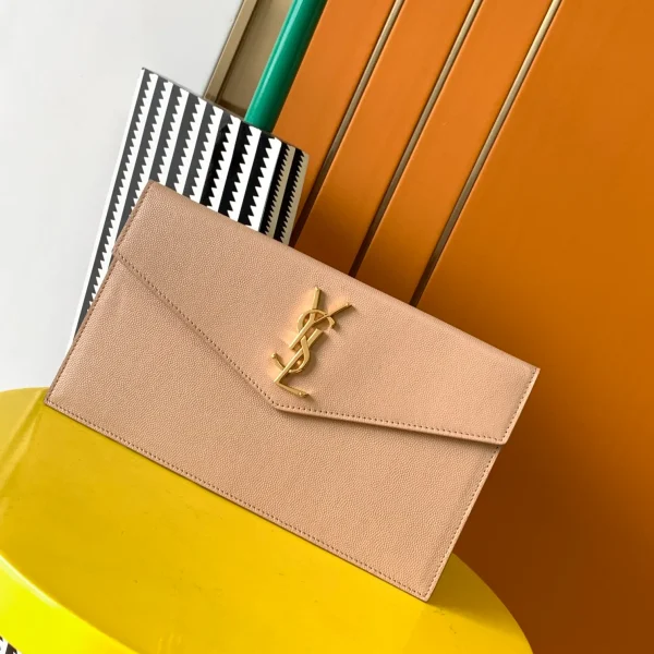 Uptown leather clutch in beige